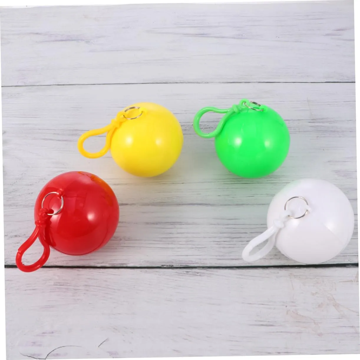 BESPORTBLE Disposable Ball Poncho Unisex Easy Carry Keyring Ball Raincoat Rain Jacket Poncho Rainwear Keyring Ball Practical